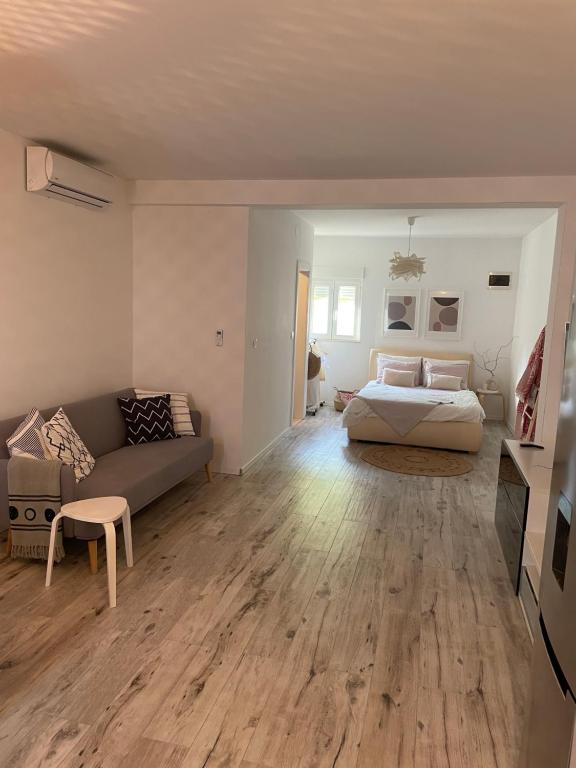 Posteľ alebo postele v izbe v ubytovaní Apartman David 73