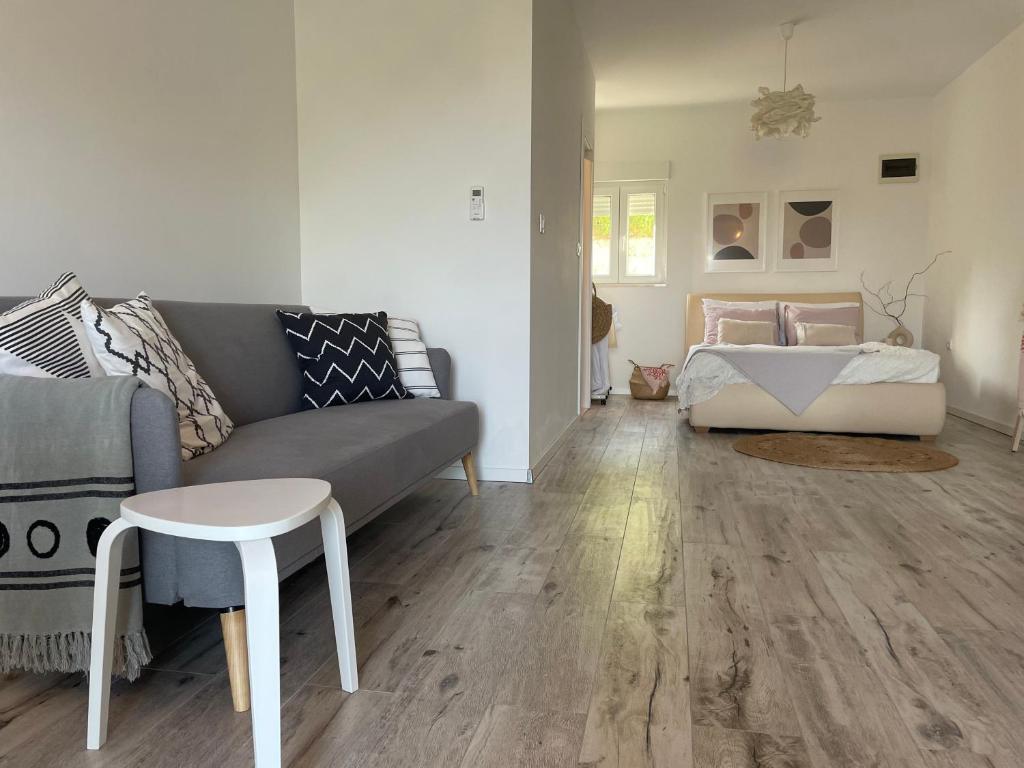 Posteľ alebo postele v izbe v ubytovaní Apartman David 73