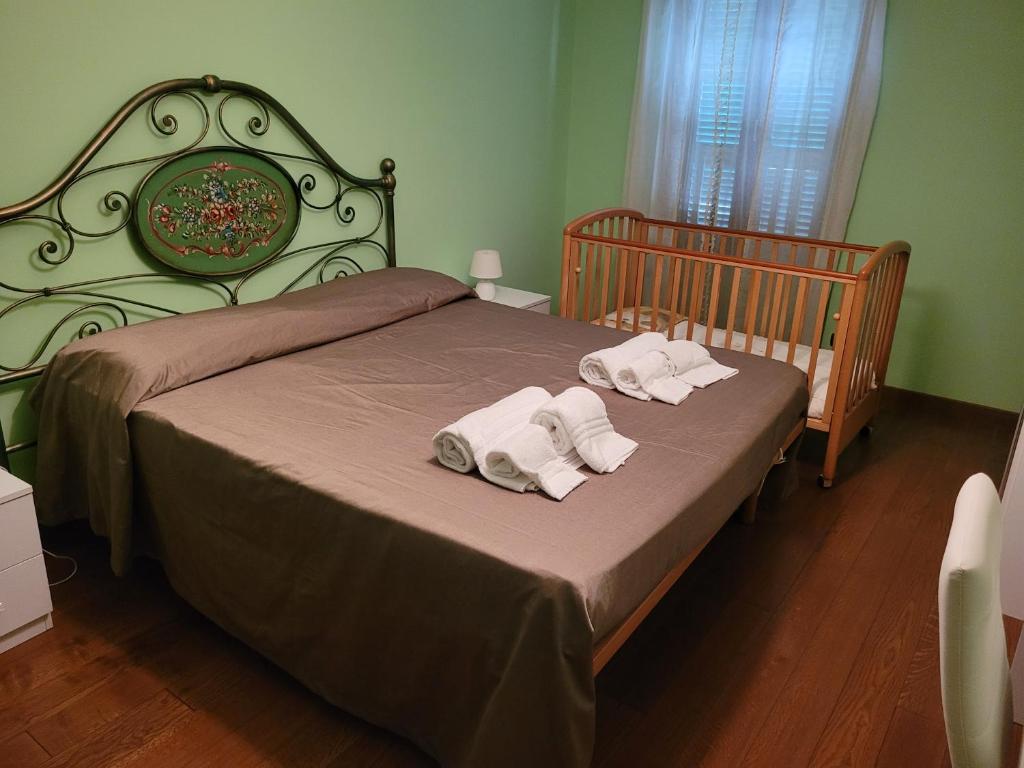 Posteľ alebo postele v izbe v ubytovaní Pisicchio Rooms
