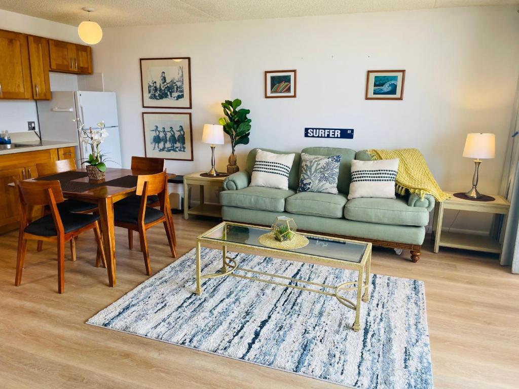 a living room with a couch and a table at Waikiki Banyan 3411 Ocean View - FREE PARKING in Honolulu