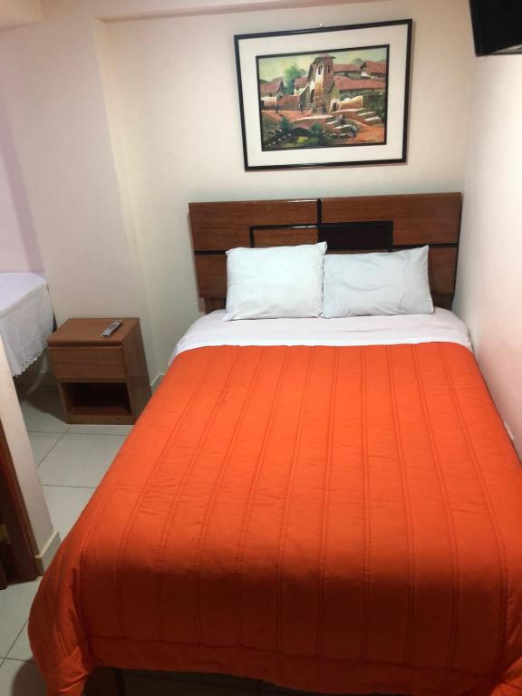 Letto o letti in una camera di Tambo Cusco Inn