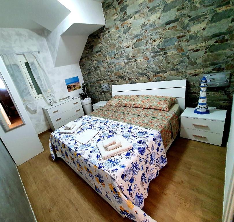 Posteľ alebo postele v izbe v ubytovaní La Perla di Marzamemi