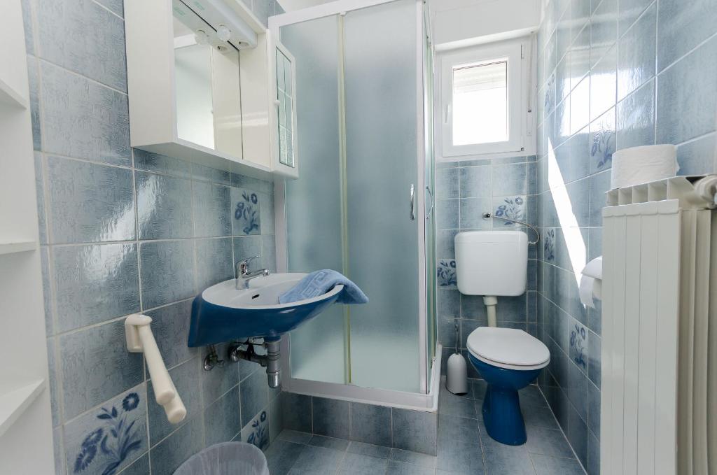 Kúpeľňa v ubytovaní Apartments Slavica R