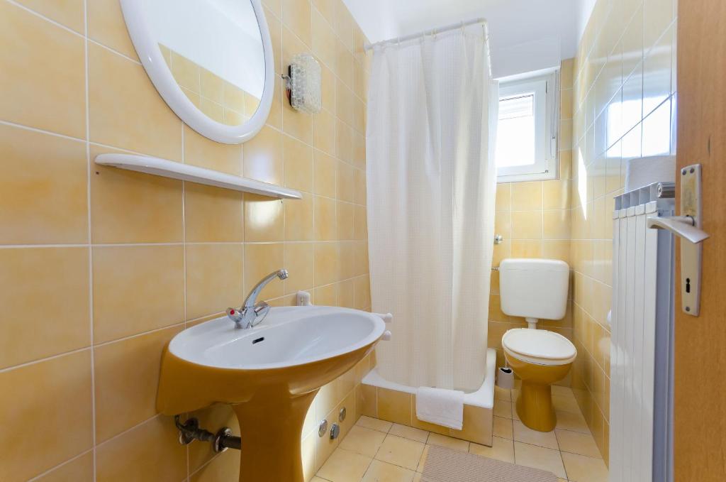Kúpeľňa v ubytovaní Apartments Slavica R