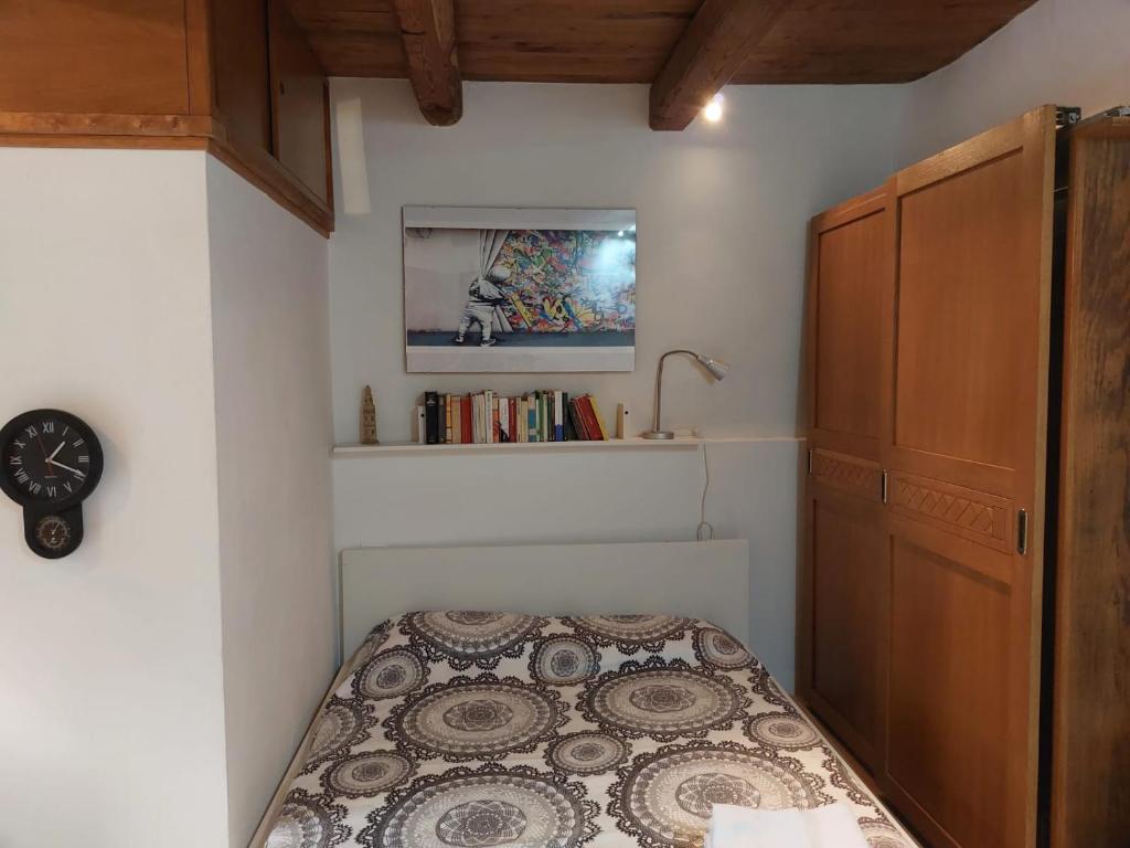 Säng eller sängar i ett rum på Casa Vittoria