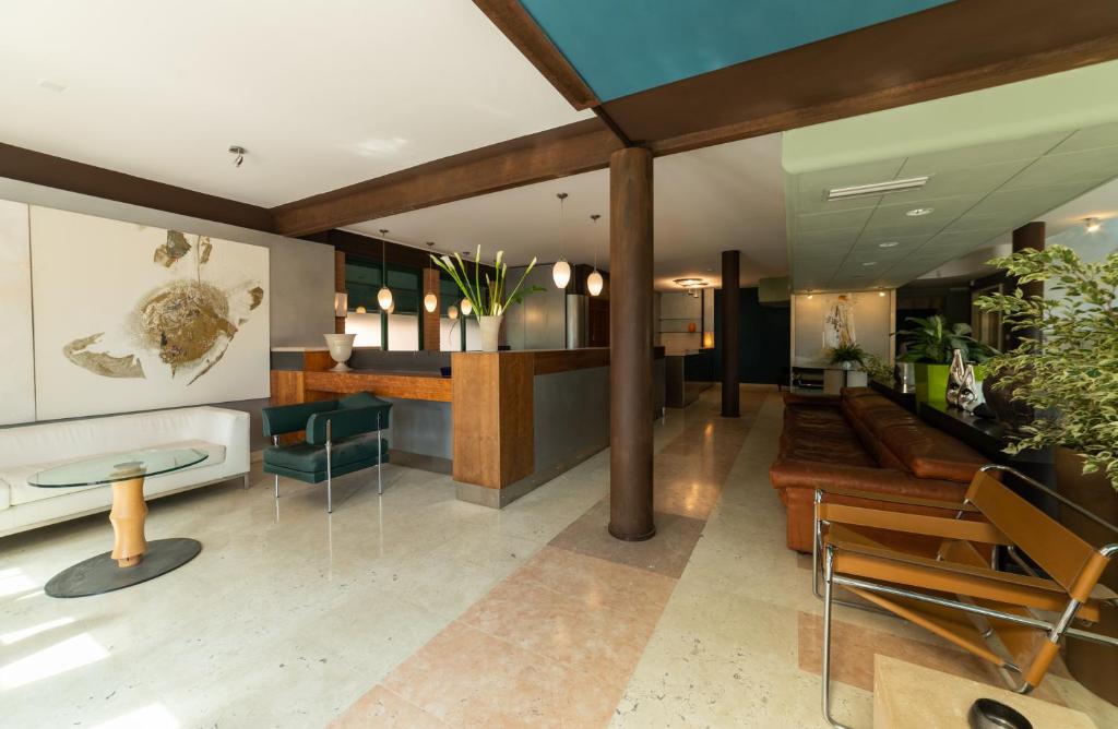 Posezení v ubytování HOTEL QUERINI Business Hotel Sandrigo