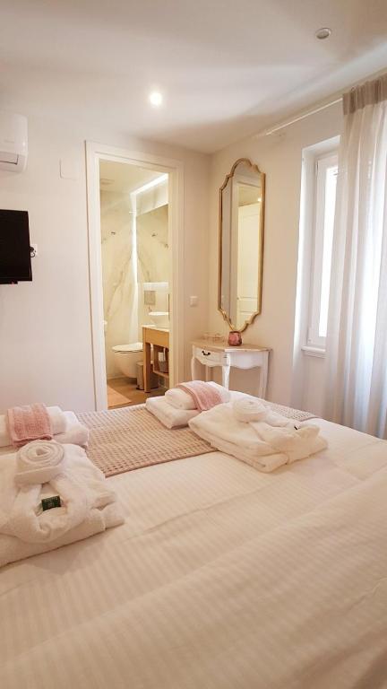 Łóżko lub łóżka w pokoju w obiekcie Sole e Luna Studio · Corfu Old Town