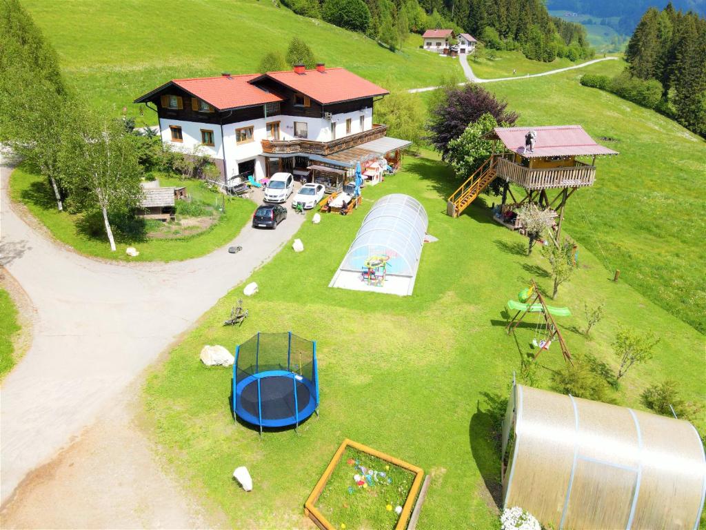 an aerial view of a house on a hill at Schöne Ferienwohnung im Naturpark Grebenzen in Sankt Lambrecht