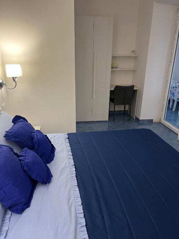 Postel nebo postele na pokoji v ubytování Relais Villa Ettore