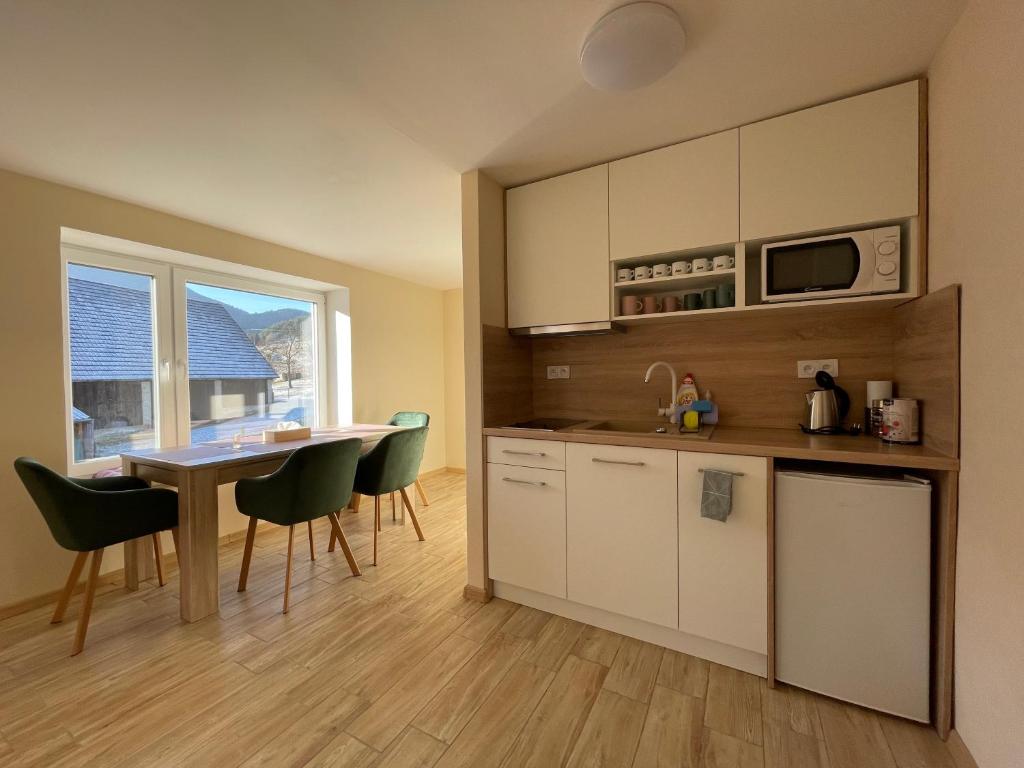 Kuchyň nebo kuchyňský kout v ubytování Totina Apartments