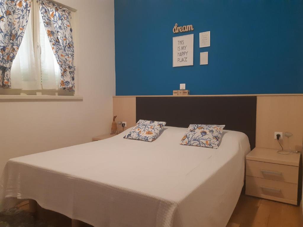 Postel nebo postele na pokoji v ubytování Apartment Rampin in Gedici