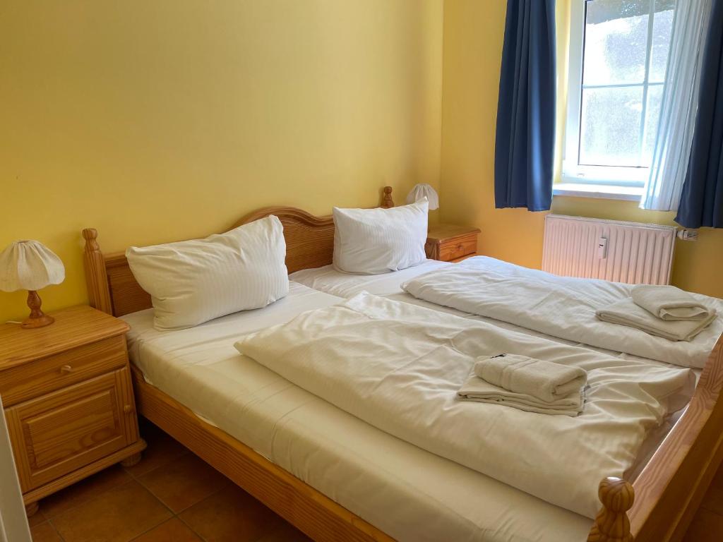 Postel nebo postele na pokoji v ubytování Störtebekers Piratennest