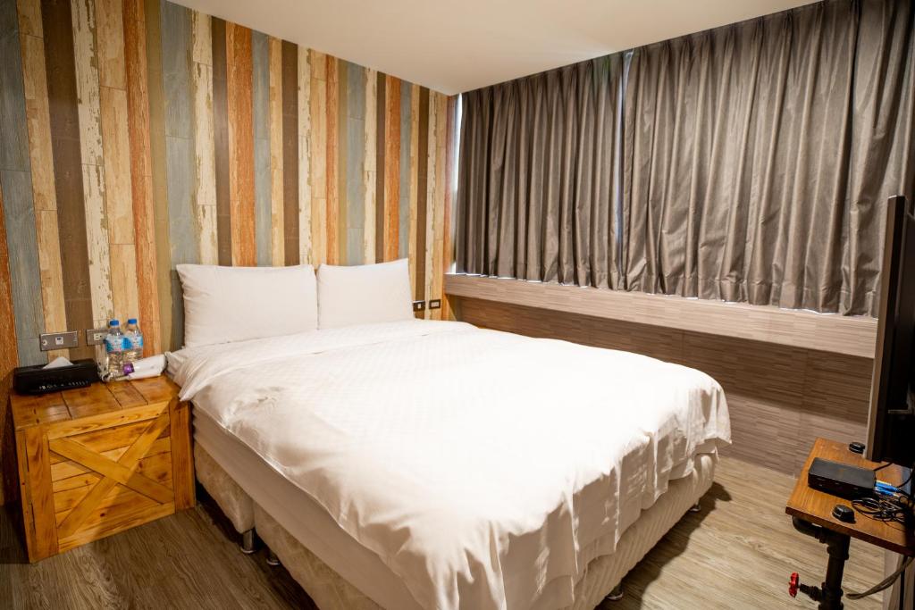Postel nebo postele na pokoji v ubytování The Cole Hotel