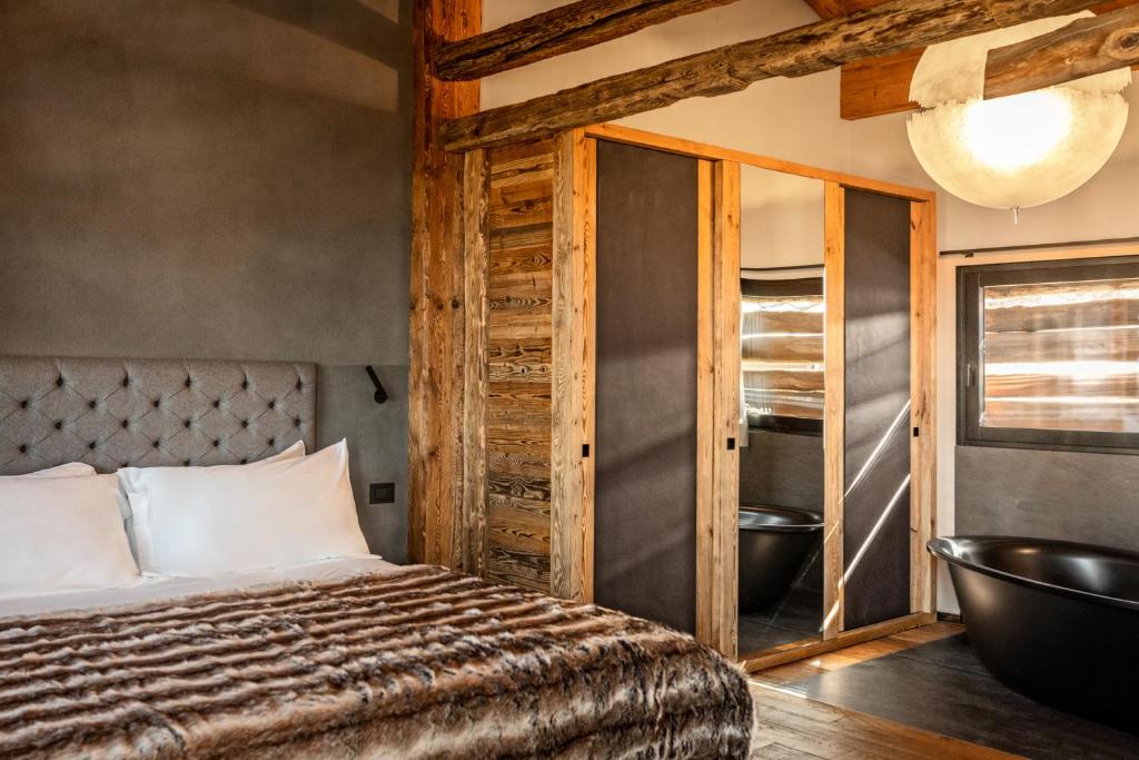 Postel nebo postele na pokoji v ubytování Cocoon Deluxe Luxury Chalet Spa F&B