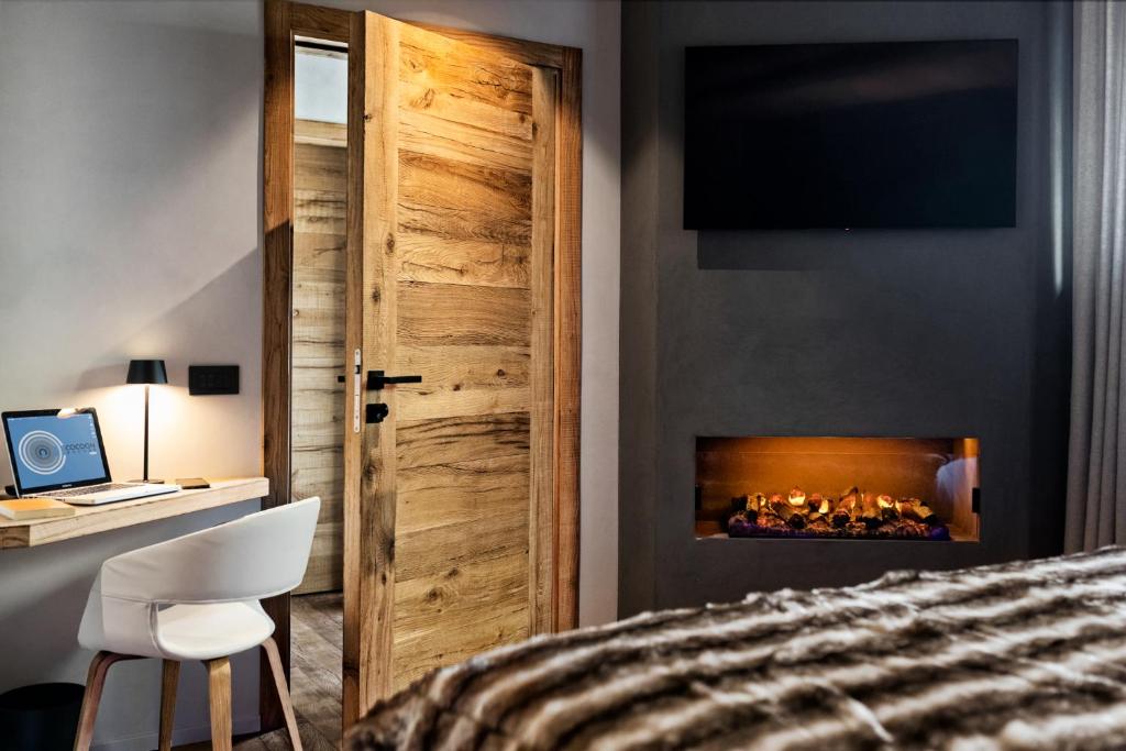 Postel nebo postele na pokoji v ubytování Cocoon Deluxe Luxury Chalet Spa F&B