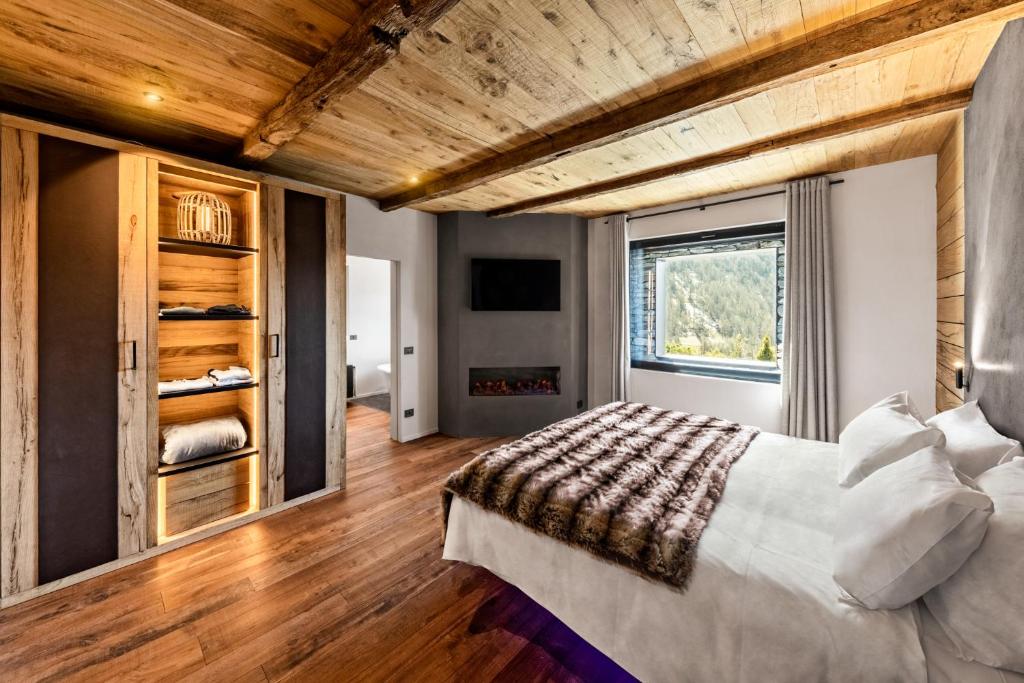 Postel nebo postele na pokoji v ubytování Cocoon Deluxe Luxury Chalet Spa F&B