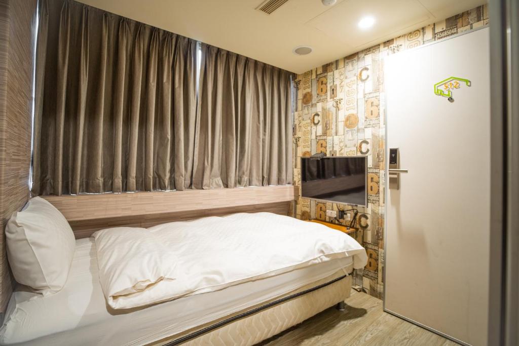 Postel nebo postele na pokoji v ubytování The Cole Hotel