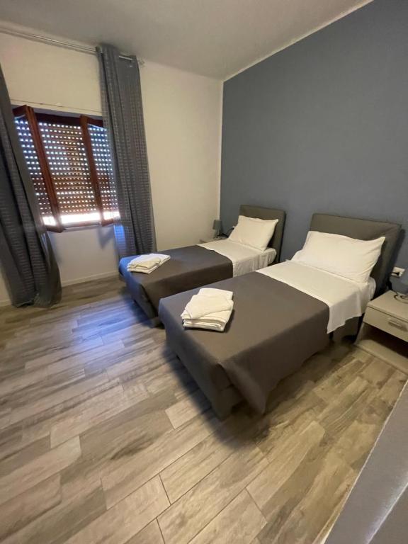 Postel nebo postele na pokoji v ubytování La Tanchetta