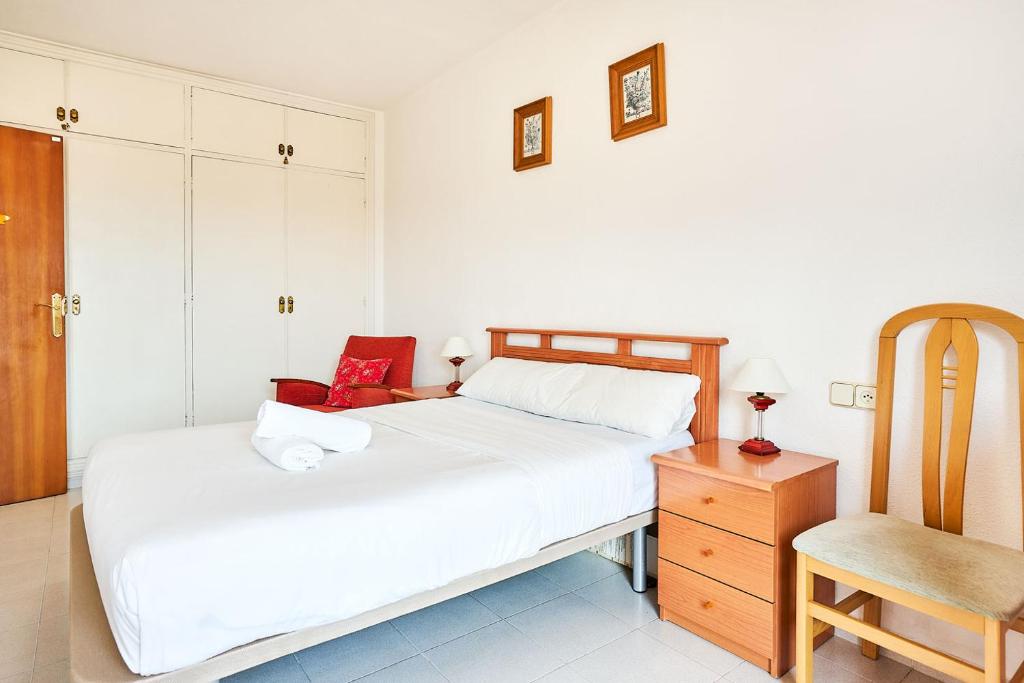 A bed or beds in a room at Espanhouse Olga apartment