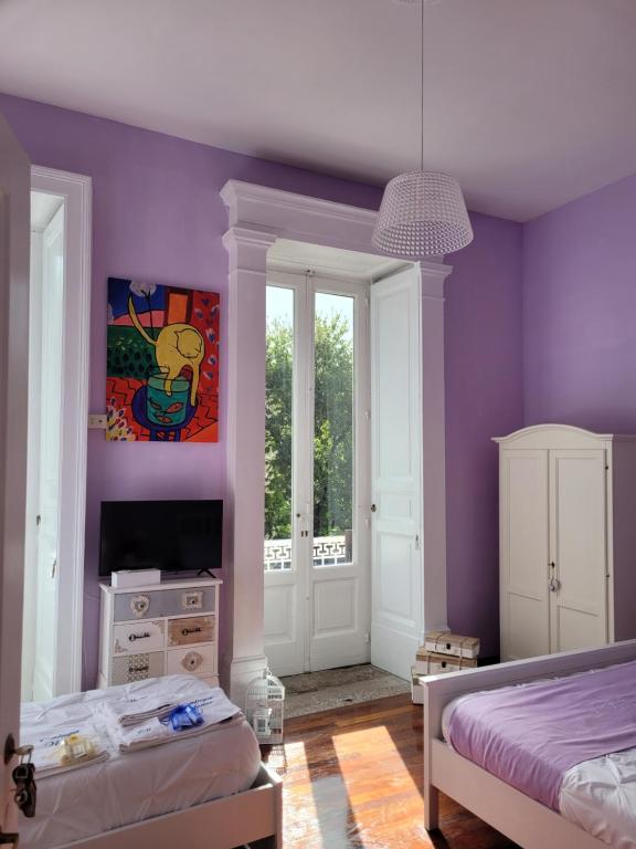 Postel nebo postele na pokoji v ubytování Caluga House