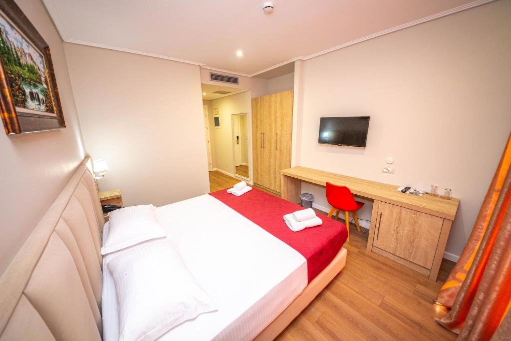 Letto o letti in una camera di CLASS Hotel