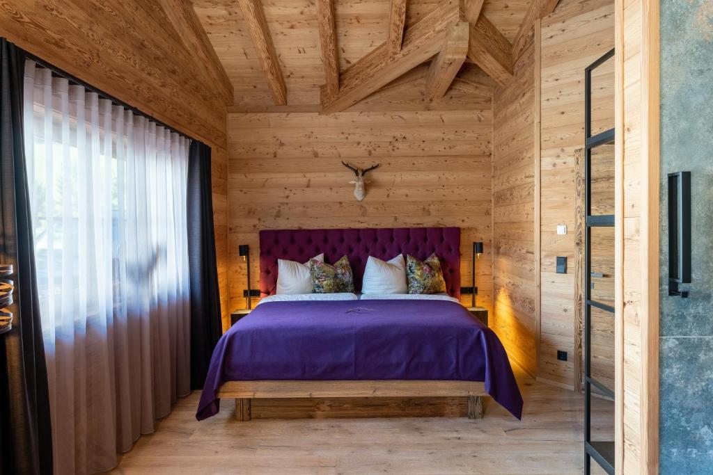 Posteľ alebo postele v izbe v ubytovaní Mountain Chalet R