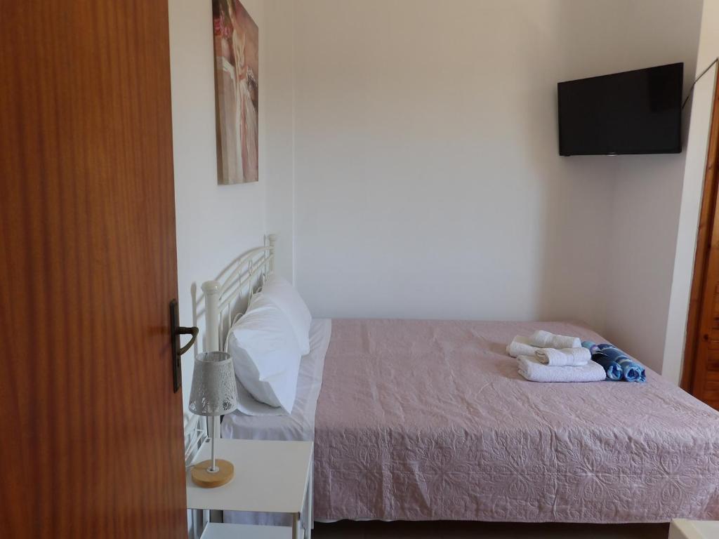 Łóżko lub łóżka w pokoju w obiekcie TEO 1 Apartment