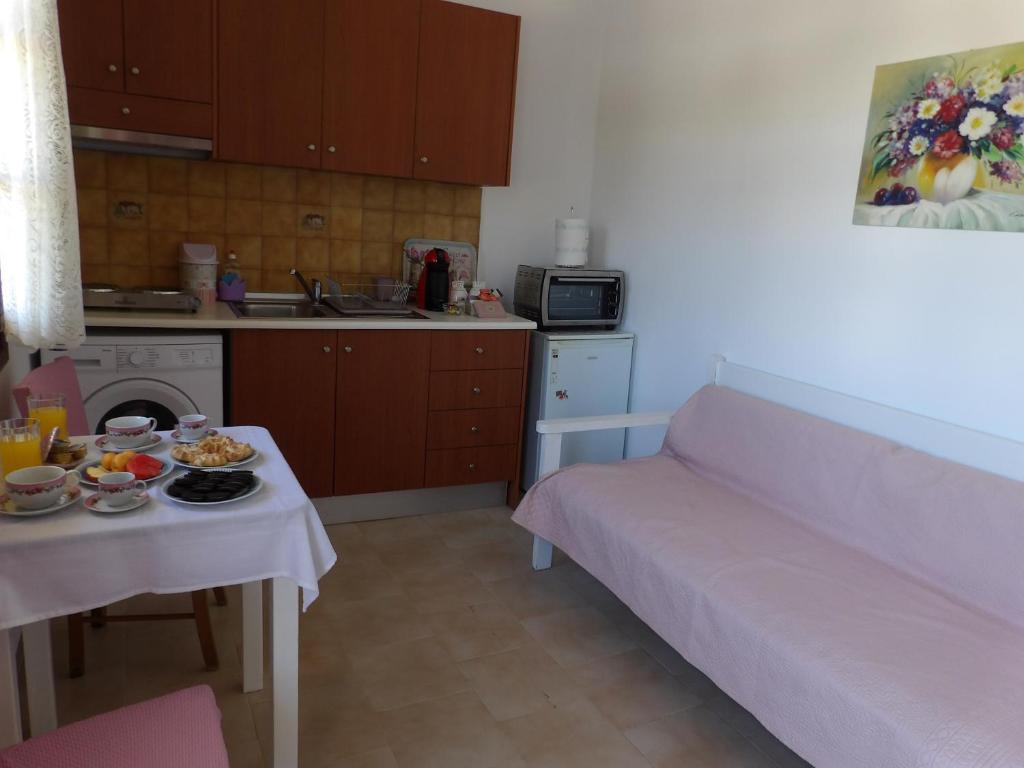 Kuchnia lub aneks kuchenny w obiekcie TEO 1 Apartment