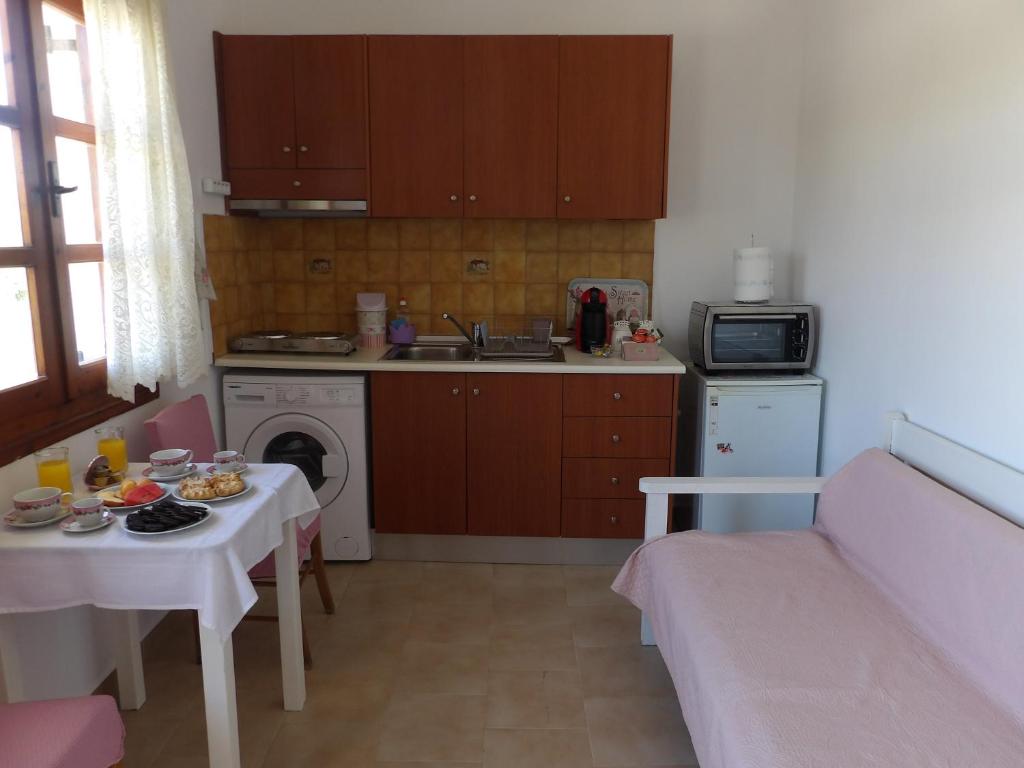 Kuchnia lub aneks kuchenny w obiekcie TEO 1 Apartment