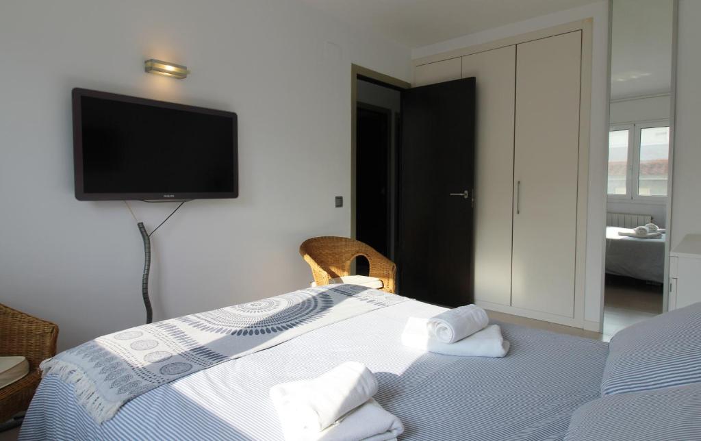 Posteľ alebo postele v izbe v ubytovaní Apartamento esquinero en Palamós