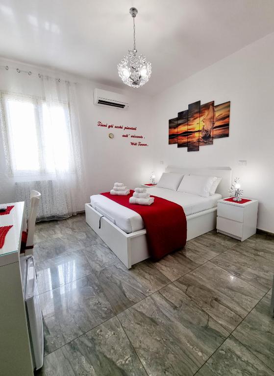 Postel nebo postele na pokoji v ubytování Albatros B&B Porto Cesareo