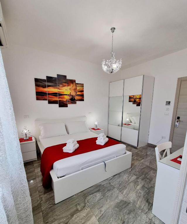 Postel nebo postele na pokoji v ubytování Albatros B&B Porto Cesareo