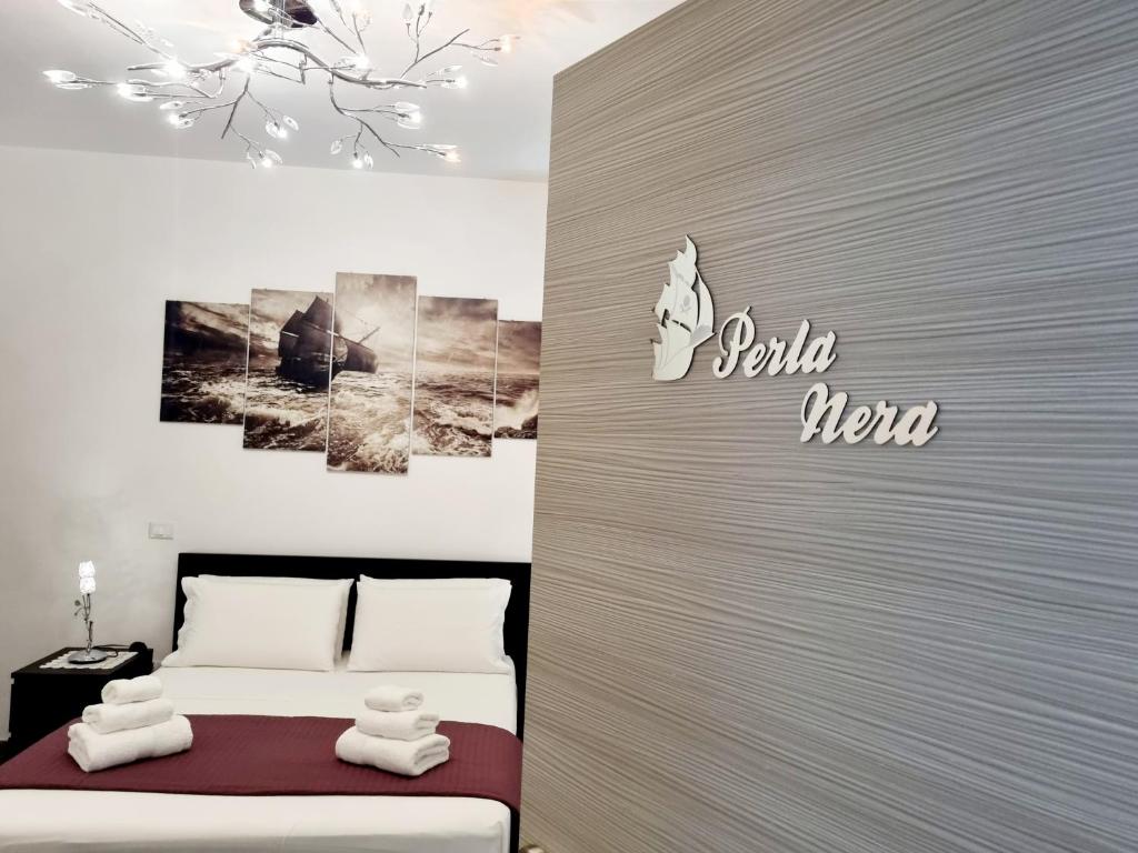 Postel nebo postele na pokoji v ubytování Albatros B&B Porto Cesareo