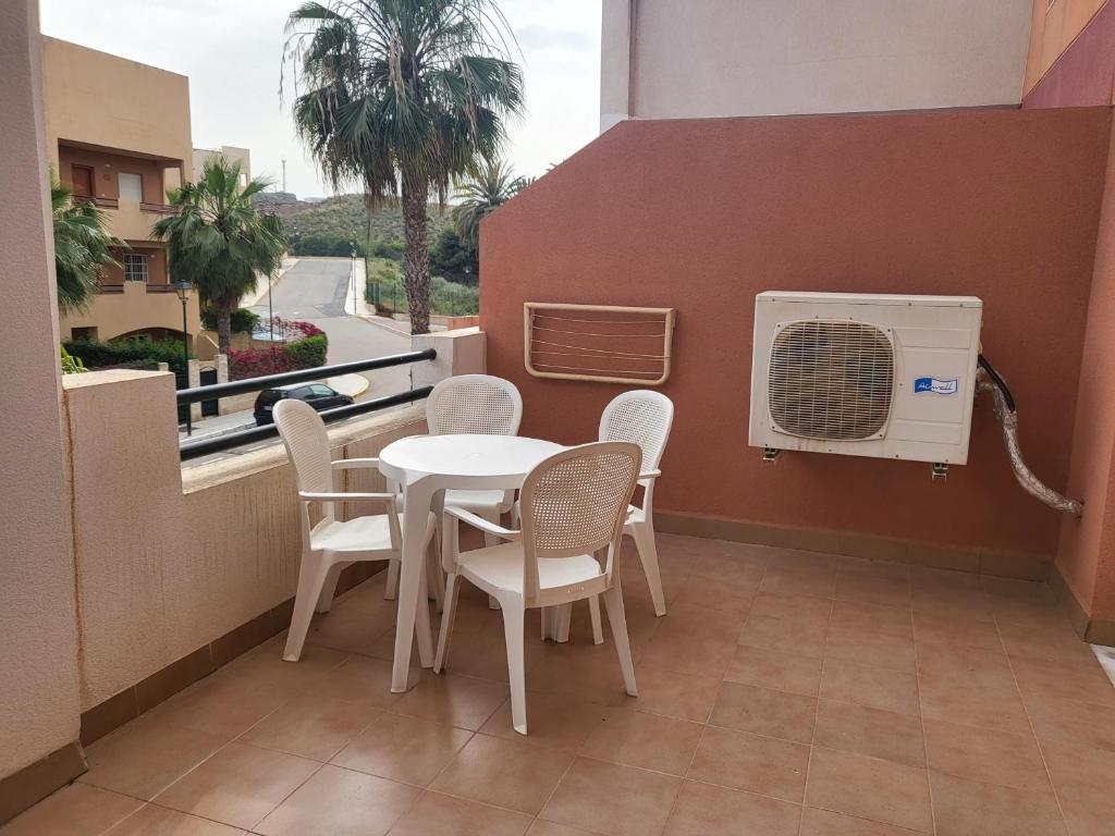 Posedenie v ubytovaní ¡Apartamento cerca de la piscina en paraíso de Vera!