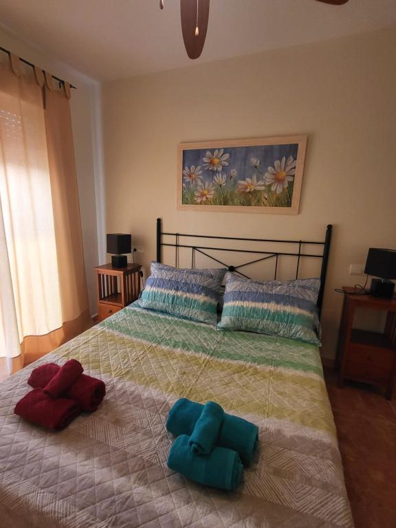 Posteľ alebo postele v izbe v ubytovaní ¡Apartamento cerca de la piscina en paraíso de Vera!