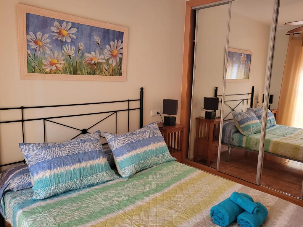 Posteľ alebo postele v izbe v ubytovaní ¡Apartamento cerca de la piscina en paraíso de Vera!