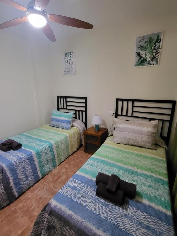 Posteľ alebo postele v izbe v ubytovaní ¡Apartamento cerca de la piscina en paraíso de Vera!