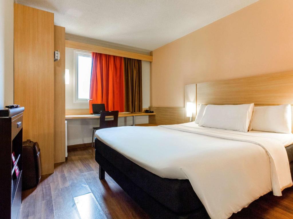 Postel nebo postele na pokoji v ubytování ibis Toulouse Aeroport