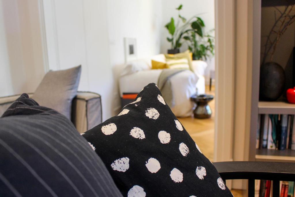 Łóżko lub łóżka w pokoju w obiekcie Valsabbion Deluxe City Suite