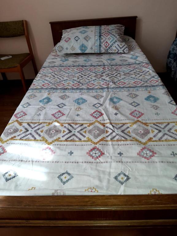 Postel nebo postele na pokoji v ubytování Nodara's garden