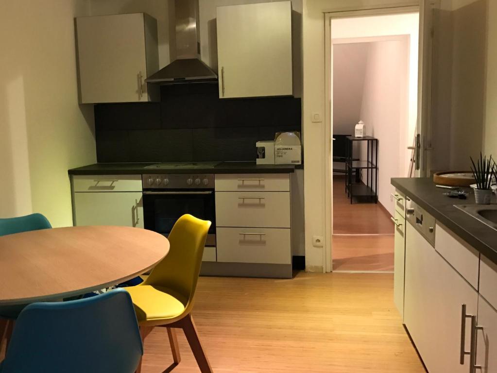 Kuchyňa alebo kuchynka v ubytovaní Jadore - Appartements meublés Mulhouse Ville