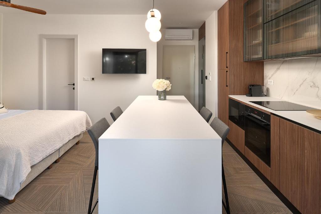 Postel nebo postele na pokoji v ubytování Luxury Apartments Villa Mala Split