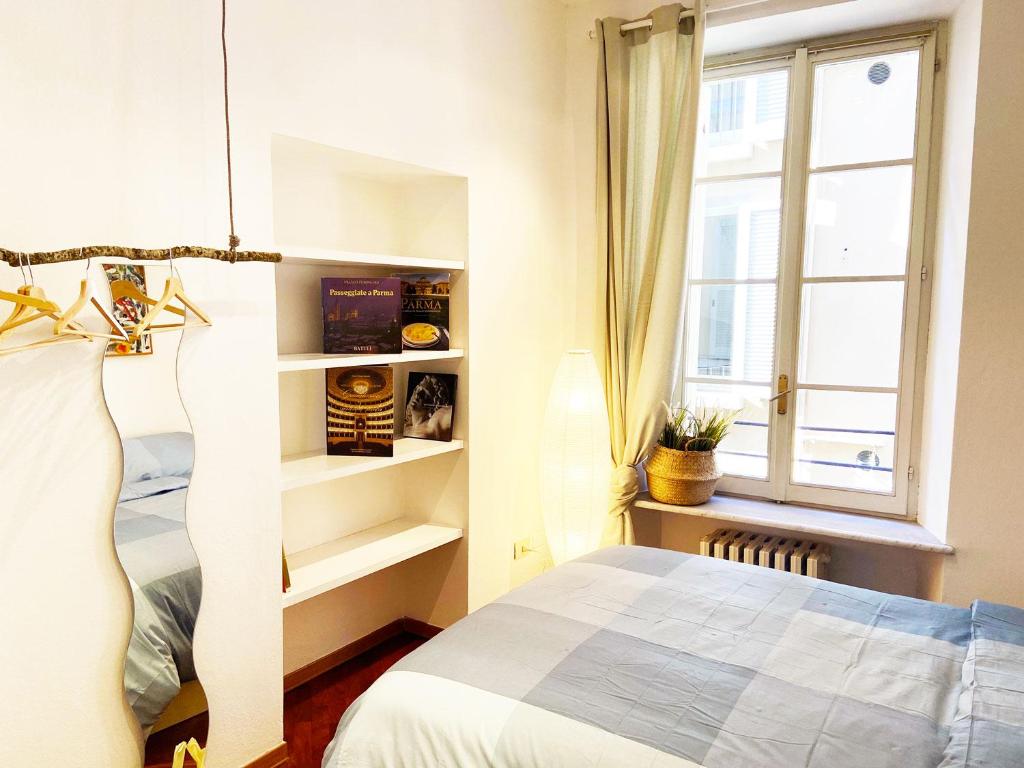 A bed or beds in a room at Wild Apartment