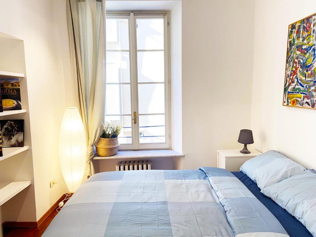 A bed or beds in a room at Wild Apartment