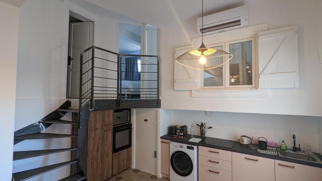 Kuchyňa alebo kuchynka v ubytovaní Appartement T3 , 650m du Palais des Festivals