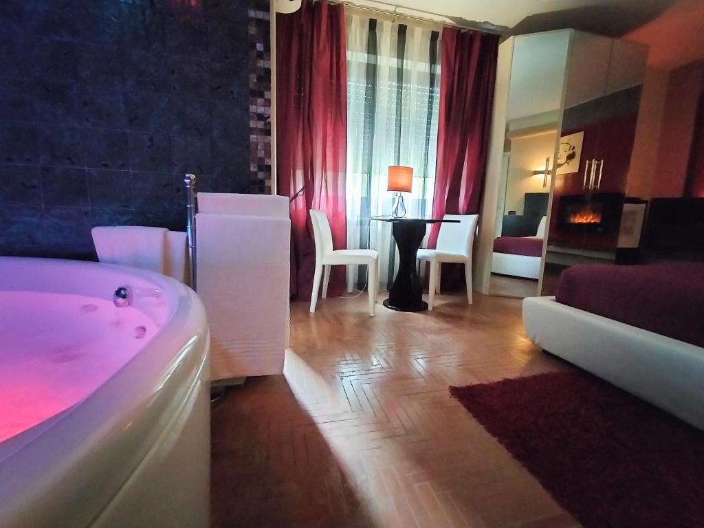 Postel nebo postele na pokoji v ubytování Hotel L' Orto degli Otelli