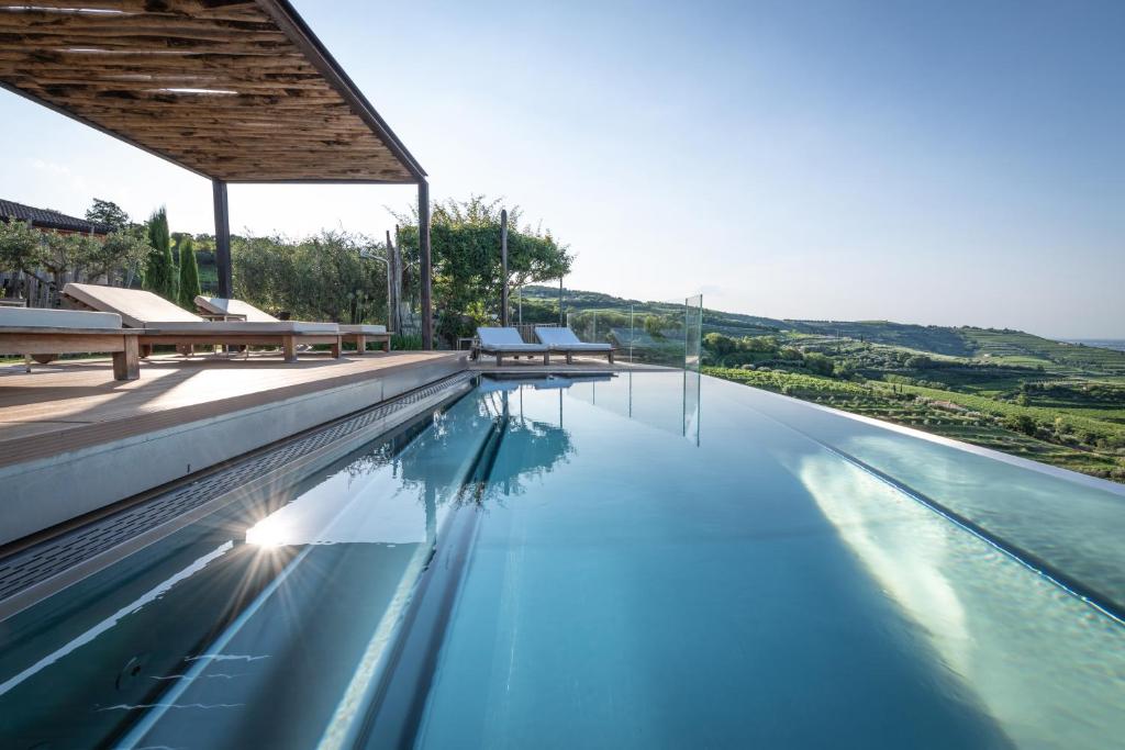 Bazén v ubytování Relais di Campagna I Tamasotti nebo v jeho okolí