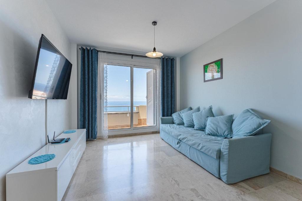TV a/nebo společenská místnost v ubytování Santiago Astalavista sea view 4