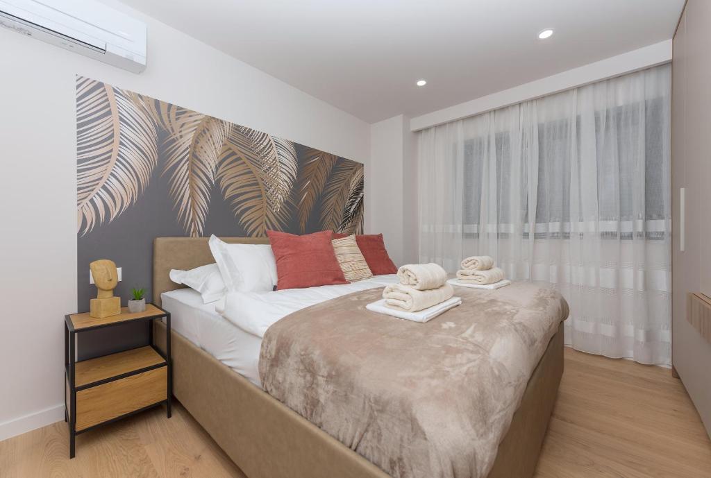 Posteľ alebo postele v izbe v ubytovaní Luxury Apartment See to Sea-Sea&City view