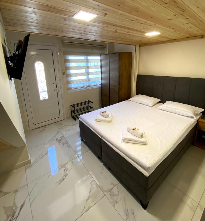 Postel nebo postele na pokoji v ubytování Apartment Radosevic